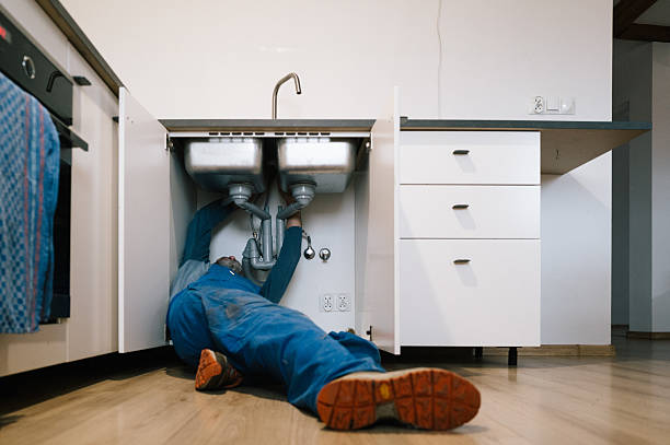 Professional Emergency Plumber technician working in Galesburg, IL